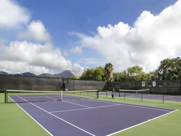 Experience Tropical Luxury in Poipu - 4 Suite Oasis